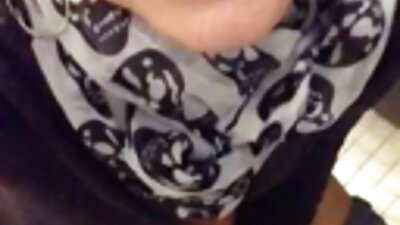 A brunette bimbo is receiving a hard cock on the sofa with a smile