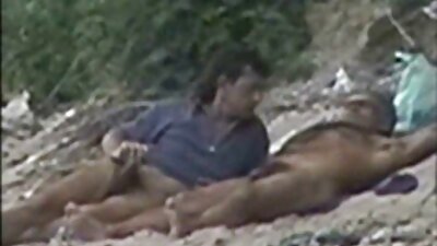 A blonde is getting a large black cock in her cunt and in her mouth