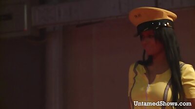 A sexy woman is getting fucked by several men at once on the sofa