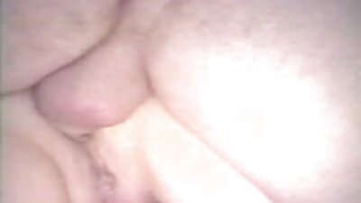 A blonde with a shaved pussy is getting cumshot on her tits