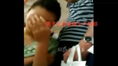 A bald black dude is pulling a brunette by her hair while fucking her